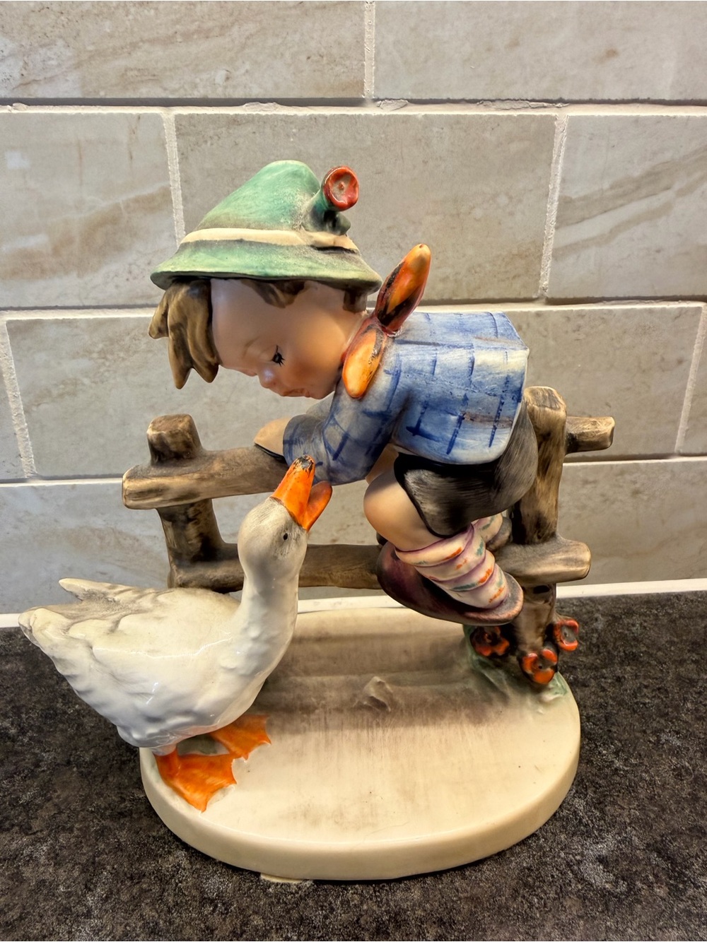 Genuine Hummel Hand-Painted Boy and Goose Porcelain Figurine (“Barnyard Hero”)